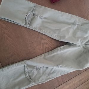 Popular distressed olive green jeans
